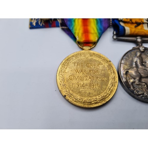 70 - 2 WW1 Service Medals Presented to Gunner H.H. Cooper. Royal Artillery, Plus Breast Bar.