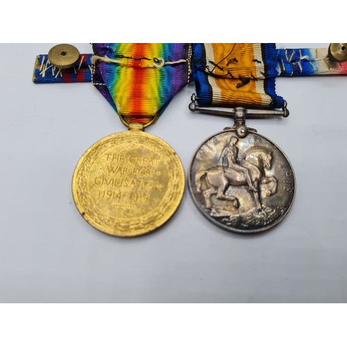 70 - 2 WW1 Service Medals Presented to Gunner H.H. Cooper. Royal Artillery, Plus Breast Bar.