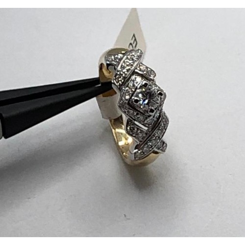 664 - 18k white and yellow gold ring with 1.40ct diamonds (centre stone of 0.40ct) weight 6.5g and size N ... 