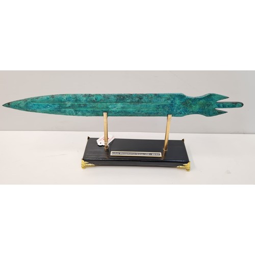 13 - An Archaic Mesopotamian sword blade. Late bronze age (1200-800 B.C.). On a custom made base. Conditi... 