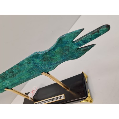 13 - An Archaic Mesopotamian sword blade. Late bronze age (1200-800 B.C.). On a custom made base. Conditi... 