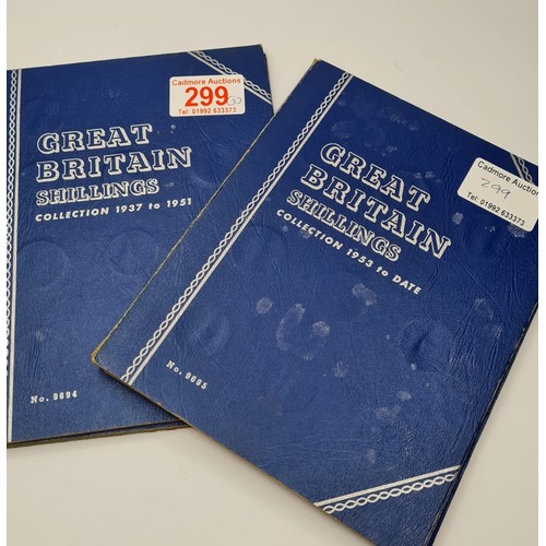 299 - A collection of 71 British shillings in 2 folders 1936 - 1966