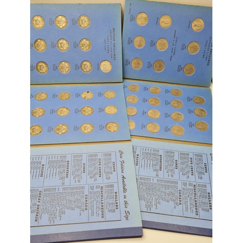 299 - A collection of 71 British shillings in 2 folders 1936 - 1966