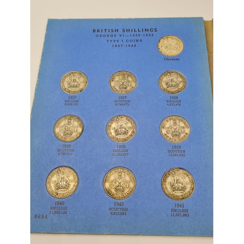 299 - A collection of 71 British shillings in 2 folders 1936 - 1966