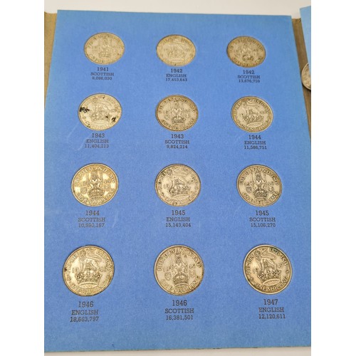 299 - A collection of 71 British shillings in 2 folders 1936 - 1966
