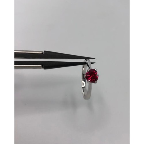 245 - 18k white gold solitaire with ruby in heart shape ( ruby 5x5x3mm); ruby could be synthetic; not test... 