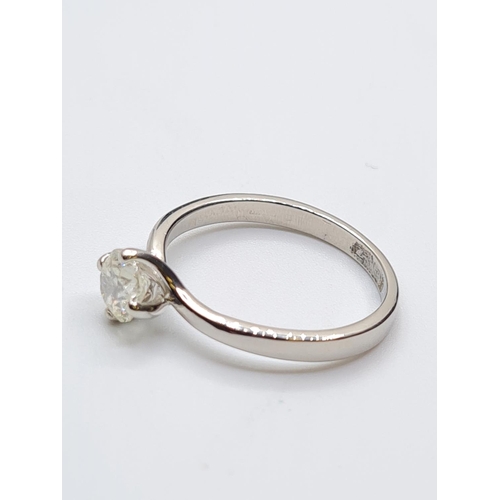 22 - PLATINUM DIA SOLITAIRE RING 0.73CT SI1/SI2 H/I 4.1G, SIZE P