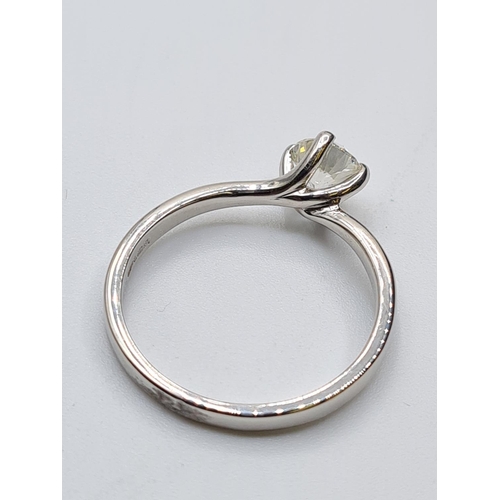 22 - PLATINUM DIA SOLITAIRE RING 0.73CT SI1/SI2 H/I 4.1G, SIZE P