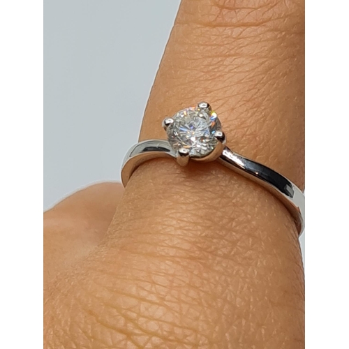 22 - PLATINUM DIA SOLITAIRE RING 0.73CT SI1/SI2 H/I 4.1G, SIZE P