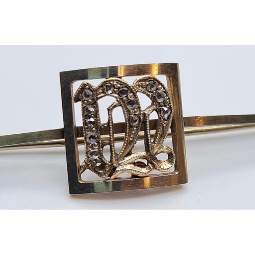 168 - 9ct gold bar brooch with 18ct gold and diamond initial M, weight 3.3g and 5cm long approx