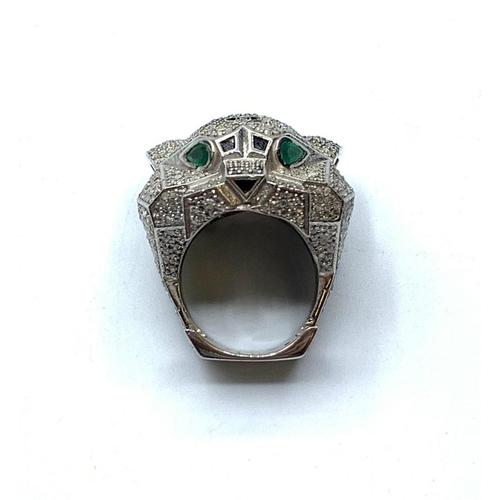 15 - An impressive statement diamond panther ring in the Cartier style. White metal (untested) with over ... 