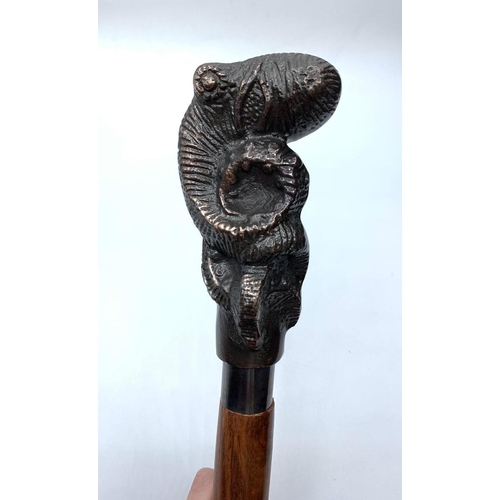 31 - An unusual, three part, collapsible walking stick with a bronze head representing an octopus. Octopu... 