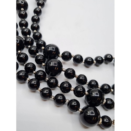 429 - Black Onyx and white gold necklace, 207g and 105cm long