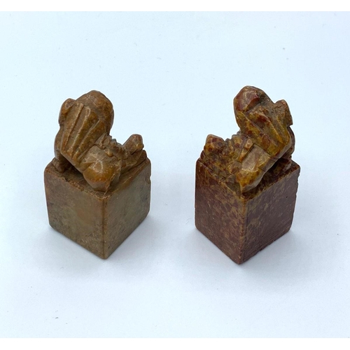 99 - An antique, near pair, Chinese, hand carved, seal stones of fu dogs. Height: 4.5 & 5cm.