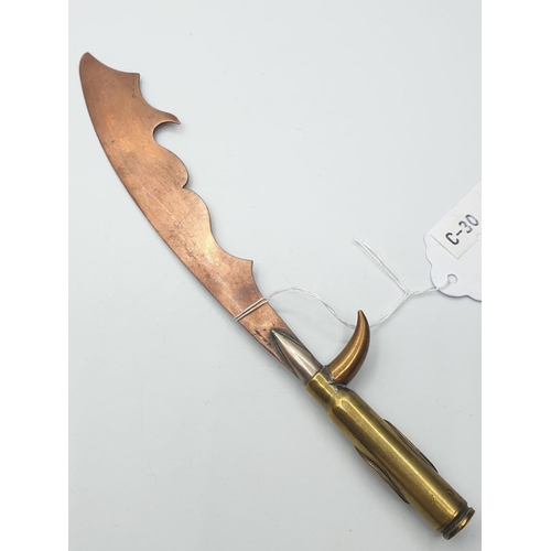 121 - WW1 Trench Art Letter Opener. Made from a German Bullet with British G.S Button soldiered onto it.