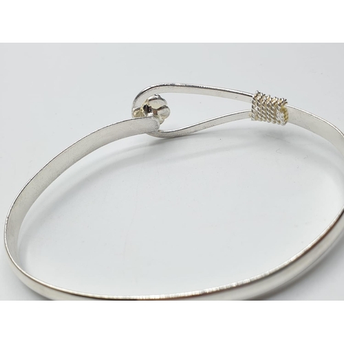 299 - Tiffany Style Silver Bangle. 11g