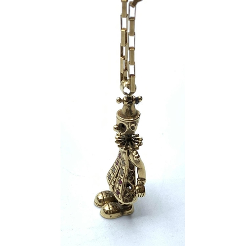 154 - Gold doll on gold chain, weight 11.2g