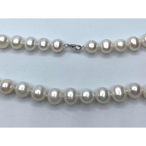 357 - Pearls with gold clasp, weight 66g