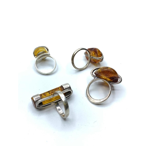 358 - 4 silver amber rings