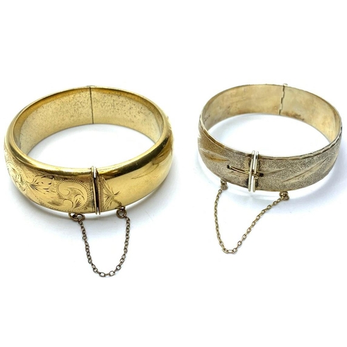 394 - Rolled gold bangle & a silver + gold bangle, weight 68g