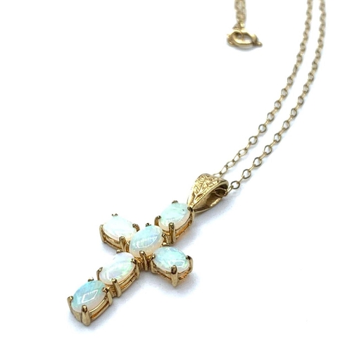 395 - 9ct gold opal cross