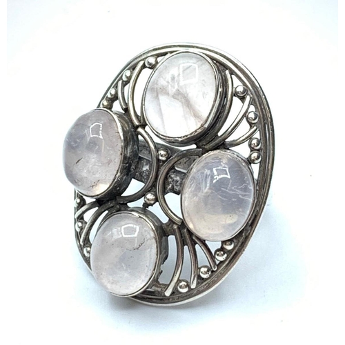 432 - Silver ring with moonstones, size N