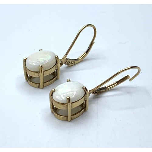 344 - 9ct gold and white opel earrings, weight 3.0g