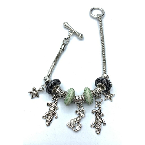 380 - Pandora style charm bracelet, weight 17g & length 18cm