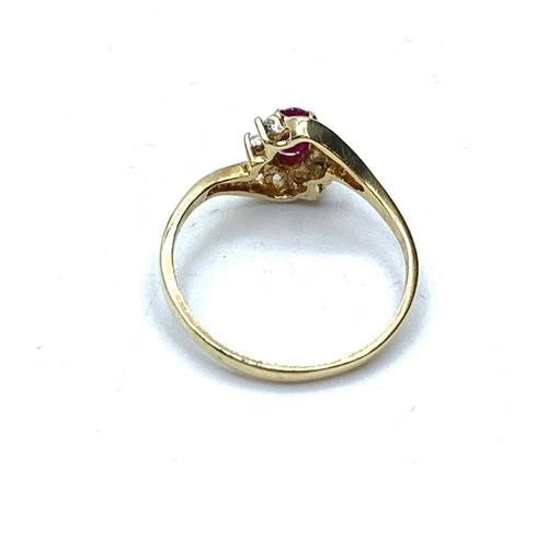 428 - 14 Carat Ruby and Diamond Ring, Size K.