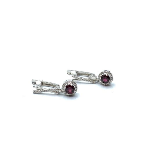 454 - 925 Sterling Silver Set with Garnets and White Stones.