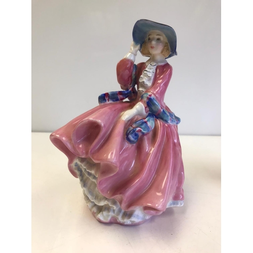 196 - Two Doulton Figurines: Top 'O' The Hill and Christmas Morn.