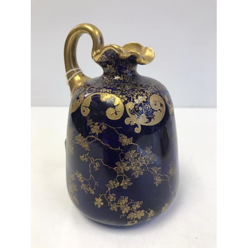 218 - A Gilt & Cobalt Blue Doulton Burslem Jug.