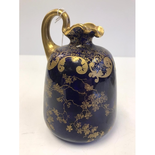 218 - A Gilt & Cobalt Blue Doulton Burslem Jug.