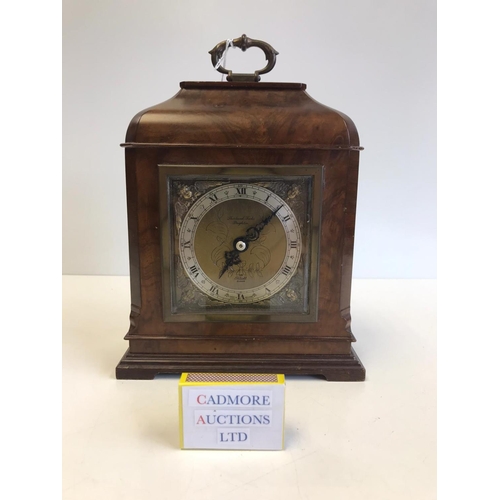 222 - A Walnut Cased Mantle Clock by Shorland Fooks Brighton, Elliott Clock.