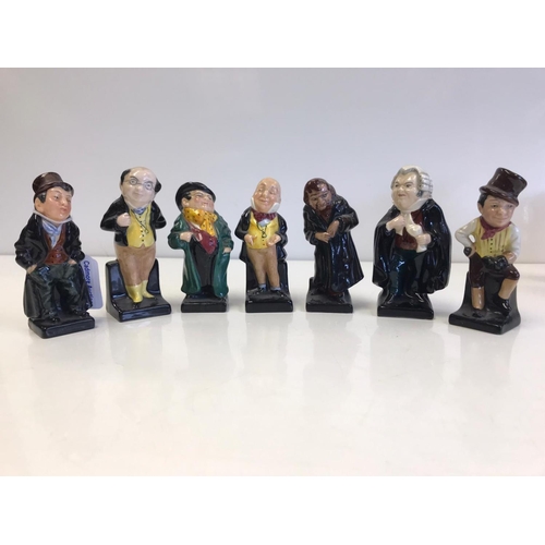 224 - Seven Royal Doulton Dickens, Oliver Twist Figurines.