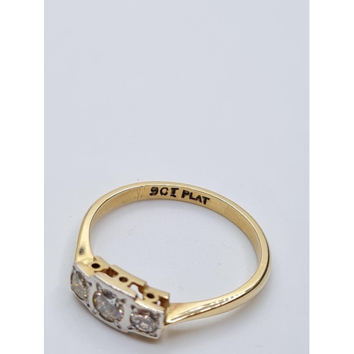 509 - Vintage 9ct gold ring with a trilogy of diamonds set in platinum, weight 193g, size P/Q