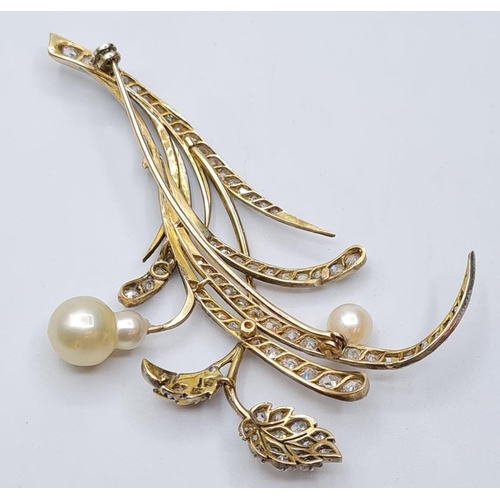 522 - Platinum and diamond flower brooch with pearl blooms, weight 11.12g & 7cms long