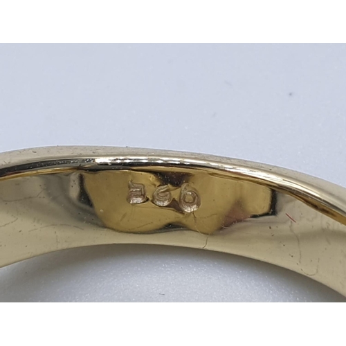 566 - An unusual, silver (stamped “925”) and 18ct gold filled, two finger ring with cubic zirconia.