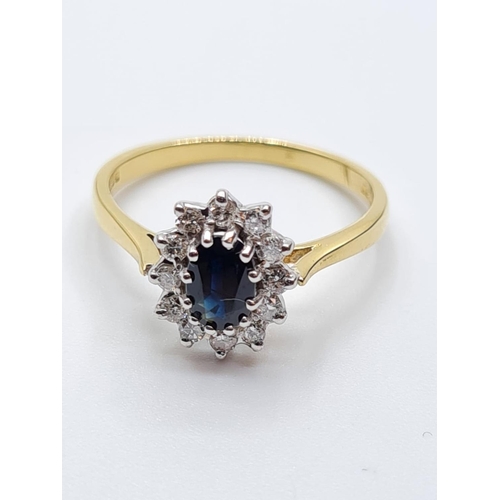 22 - 18ct diamond and sapphire cluster ring, weight 2.8g and 0.20ct diamond approx, size N