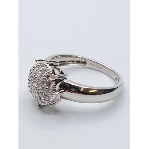 30 - 18ct white gold diamond cluster ring, weight 4.4g and 0.45ct diamonds approx, size O