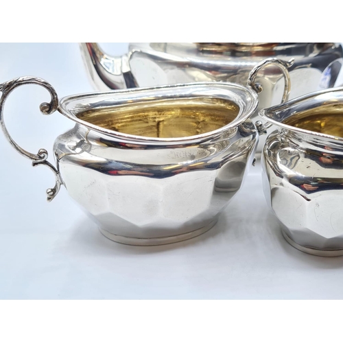 39 - Silver Teapot, Creamer, Sugar bowl made in Birmingham 422g.