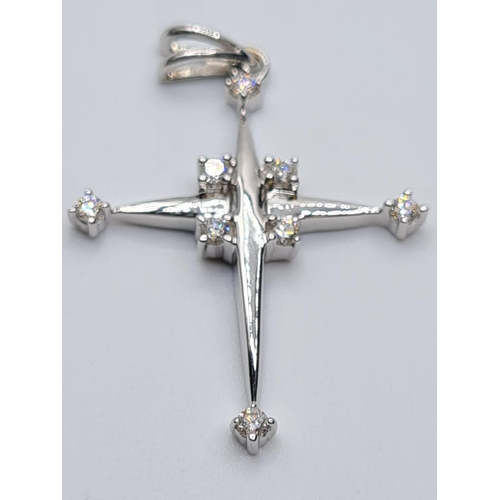 4 - 18ct white gold diamond set cross, weight 2.7g and 0.40ct diamonds approx