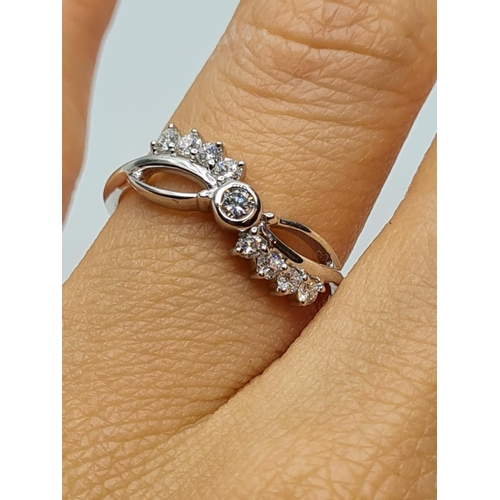 45 - 18ct white gold diamond fancy ring weight 2.3g with 0.25ct diamonds approx size N