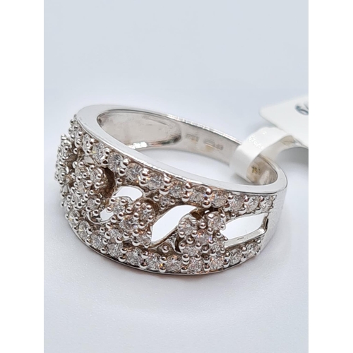 95 - 18ct white gold diamond set fancy band ring, weight 5.7g and 0.85ct diamonds approx, size N