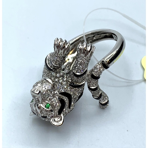 132 - Diamond encrusted panther shaped ring in 18ct white gold, weight 14.1g and size M