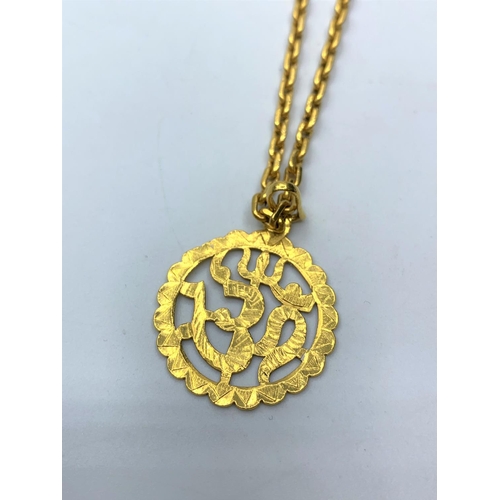 443 - 22ct gold chain with Eastern pendant, weight 41g & length 65cms