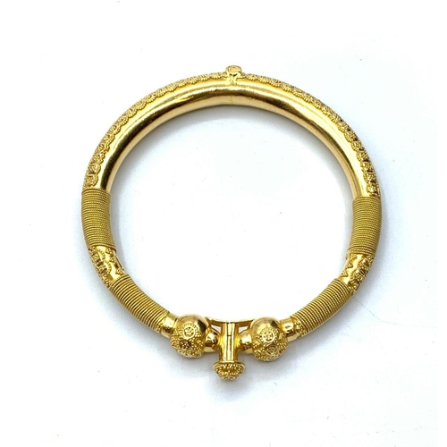 302 - Ornate Far Eastern 22ct Gold Bangle, 31.4g.