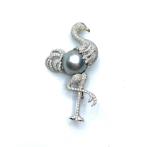 46 - 18ct white gold Flamingo diamond brooch with south sea pearl body, 15.6g weight, 5.5cm long