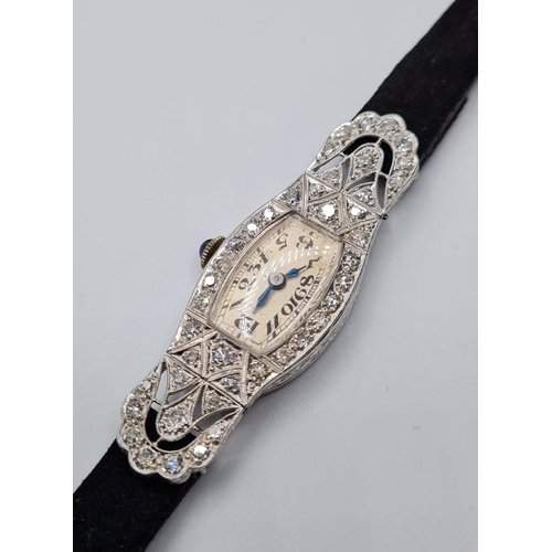 572 - Vintage platinum and diamond cocktail watch