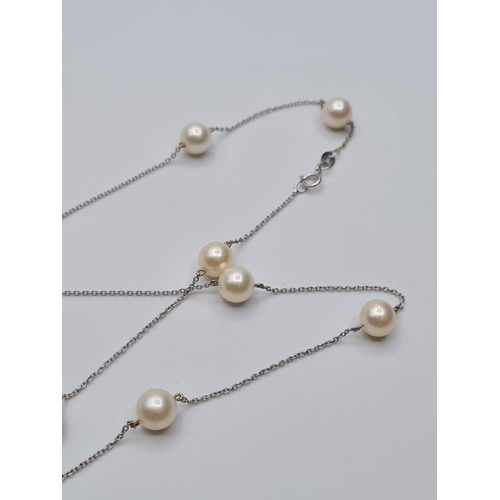 591 - Pearl Necklace in 18ct White Gold, 7.3g, 44cms.